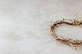 Minimalistic background with a wreath of thin twigs