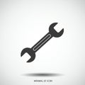 A minimalistic black icon of a wrench is centered on a light gray background. The Royalty Free Stock Photo