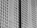 Minimalistic black and white building with multiple windows architecture backdrop Royalty Free Stock Photo