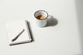 Minimalistic Blank Notepad with Pen and Coffee for Designing and Creating