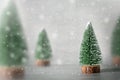 Minimalistic christmas composition with decorative fir tree,wooden sledge ,snow on grey background