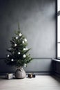 Minimalistic Christmas interior - dark grey concrete wall and a sleek Christmas tree