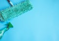 Minimalistic composition with mop and detergent for cleaning and keeping clean Royalty Free Stock Photo
