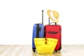 Minimalistic composition with suitcase luggage for summer vacation. Travel light concept.