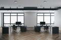 Minimalistic coworking office interior with furniture, computers and city view Royalty Free Stock Photo