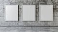 Minimalistic display of three blank frames on grey brick wall for elegant interior design Royalty Free Stock Photo
