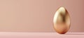 Minimalistic Easter Banner with Golden Egg on Pastel Background for Elegant Designs Royalty Free Stock Photo