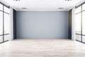 Minimalistic empty spacious interior with blank gray wall