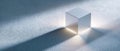Minimalistic glowing cube casting long shadows on textured surface with soft ambient lighting and cool tones in abstract Royalty Free Stock Photo