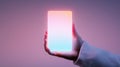 minimalistic hand holding glowing mobile device with soft gradient