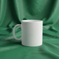 Is minimalistic, highlighting the mug\'s simple design against the rich Royalty Free Stock Photo