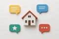 Minimalistic house model with colorful speech bubbles illustration for creative design and communication concept Royalty Free Stock Photo