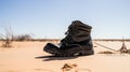 Stark Contrast: Leather Boots Against Sandy Desert Expanse