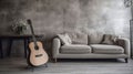 Minimalistic interior design concept. Acoustic guitar on grey textile sofa in spacious room of loft style apartment with wood