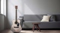 Minimalistic interior design concept. Acoustic guitar on grey textile sofa in spacious room of loft style apartment with wood