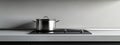 Minimalistic kitchen fire hazards stove with unattended pot in elegant design on white background Royalty Free Stock Photo