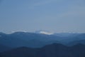 Minimalistic landscape , no people. View of snowy peak of Mount Fisht from afar. Main Caucasian ridge in reserve