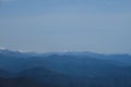 Minimalistic landscape , no people. View of snowy peak of Mount Fisht from afar. Main Caucasian ridge in reserve