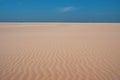 Minimalistic landscape with white sand dunes and blue sky Royalty Free Stock Photo