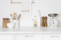 Minimalistic modern kitchen in pastel colors with kitchenware and space