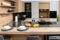 Minimalistic modern wooden panel kitchen interior Royalty Free Stock Photo