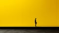 Minimalistic Modernism: Silhouette Of Man In Front Of Vibrant Yellow Wall