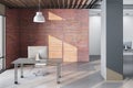 Minimalistic office interior with blank brick wall