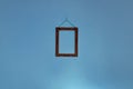 Minimalistic photo frame in a blue wall Royalty Free Stock Photo
