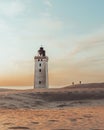 Minimalistic photo of people at sunset Rubjerg Knude Lighthouse Denmark