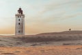 Minimalistic photo of people at sunset Rubjerg Knude Lighthouse Denmark