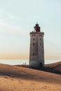 Minimalistic photo of people at sunset Rubjerg Knude Lighthouse Denmark