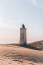 Minimalistic photo of people at sunset Rubjerg Knude Lighthouse Denmark