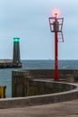 Minimalistic picture of entrance to the port with red and green navigation light Royalty Free Stock Photo