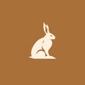 Minimalistic Rabbit Logo Icon In Dark Beige And White