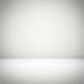Minimalistic setting with a smooth, white textured surface extending from the Royalty Free Stock Photo