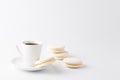 Minimalistic shot of espresso cup with one white macaroon Royalty Free Stock Photo