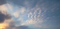 Minimalistic sky with cirrus clouds and clouds at sunset Royalty Free Stock Photo