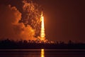 Minimalistic space shuttle launch at night with dramatic lighting and scenic reflections Royalty Free Stock Photo