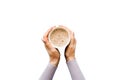 Minimalistic style woman hand holding a cup of coffee on Colored background. Flat lay, top view cappuccino cup. Empty Royalty Free Stock Photo