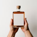 Minimalistic Symmetry: Elderly Hand Holding Bourbon Bottle With Blank Note