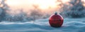 Empty Christmas Bauble on Snowy Winter Background with Copy Space Royalty Free Stock Photo