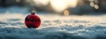 Empty Christmas Bauble on Snowy Winter Background with Copy Space Royalty Free Stock Photo