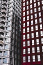 Minimalistic view of the exterior of two modern brick buildings with many windows Royalty Free Stock Photo