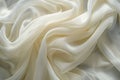 Minimalistic waves of white satin fabric draping elegantly for a sophisticated background