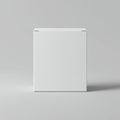 Minimalistic white cube resembling a box, placed centrally against a uniform gray Royalty Free Stock Photo