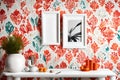 A minimalistic white frame set against a vibrant wallpaper, highlighting the contrast between simplicity and bold patterns