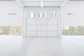 Minimalistic white gallery interior with big door and city view Royalty Free Stock Photo