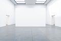Minimalistic white gallery interior with empty wall Royalty Free Stock Photo