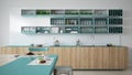 Minimalistic white kitchen with wooden and turquoise details, vegetarian breakfast, minimal interior design Royalty Free Stock Photo