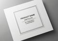 A minimalistic white product box with a square label centered on the lid. The label features Royalty Free Stock Photo